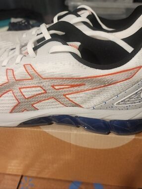 Asics White Sneakers with Orange Logo and Blue Sole. Gel Quantum 90